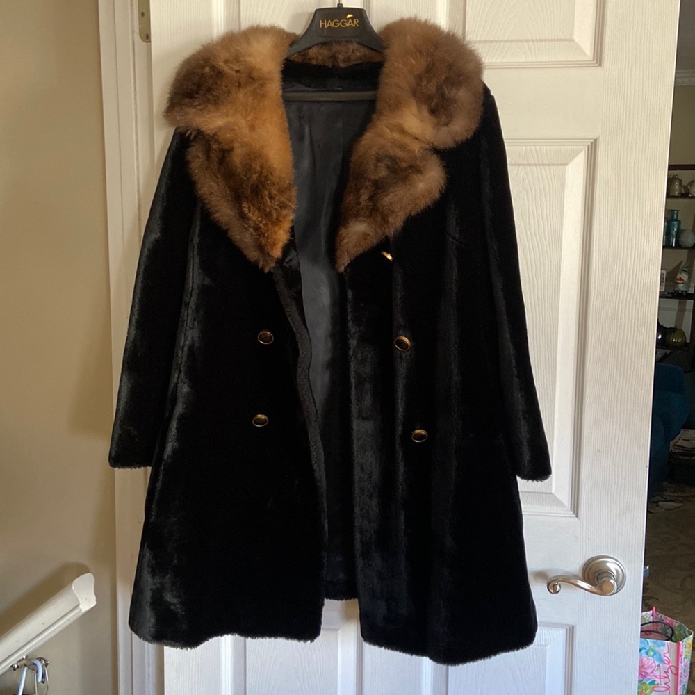 Vintage faux fur coat, from the 1960’s. Black coat with brown fur accent
